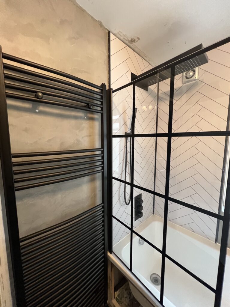 New radiator and pipework to new wall