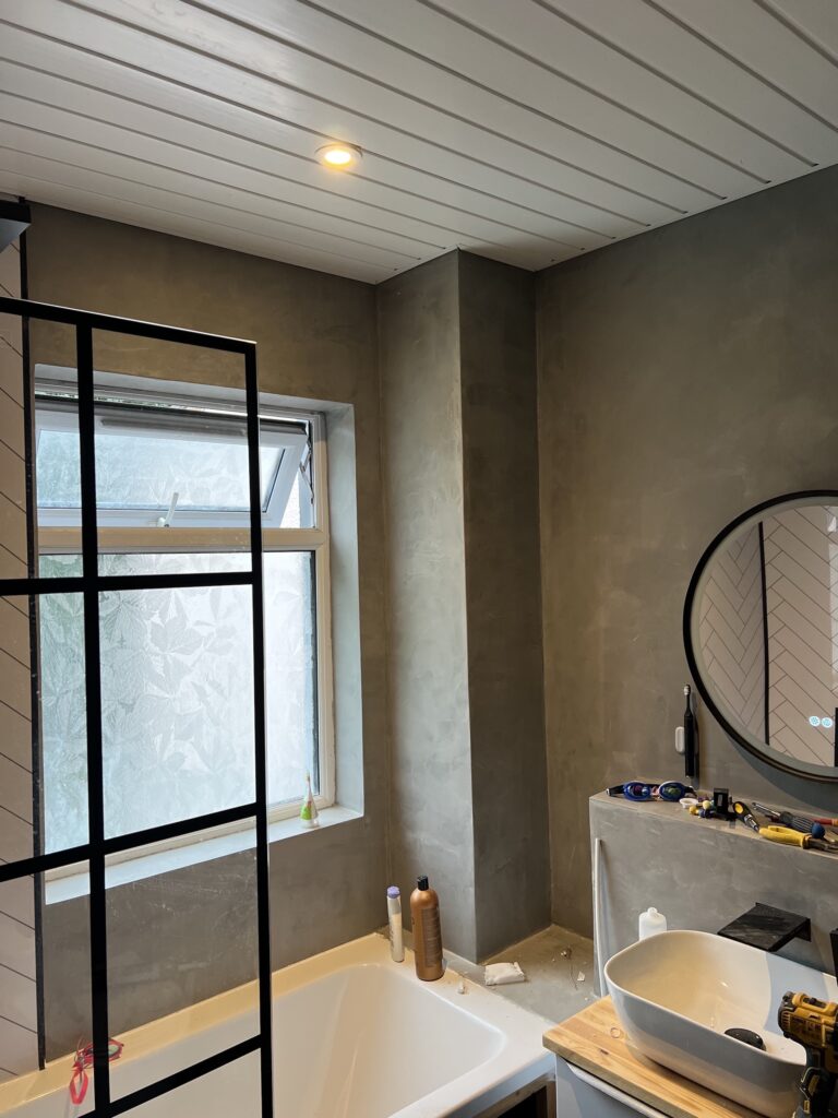 Spotlights econd coat of microcement and spotlights installed