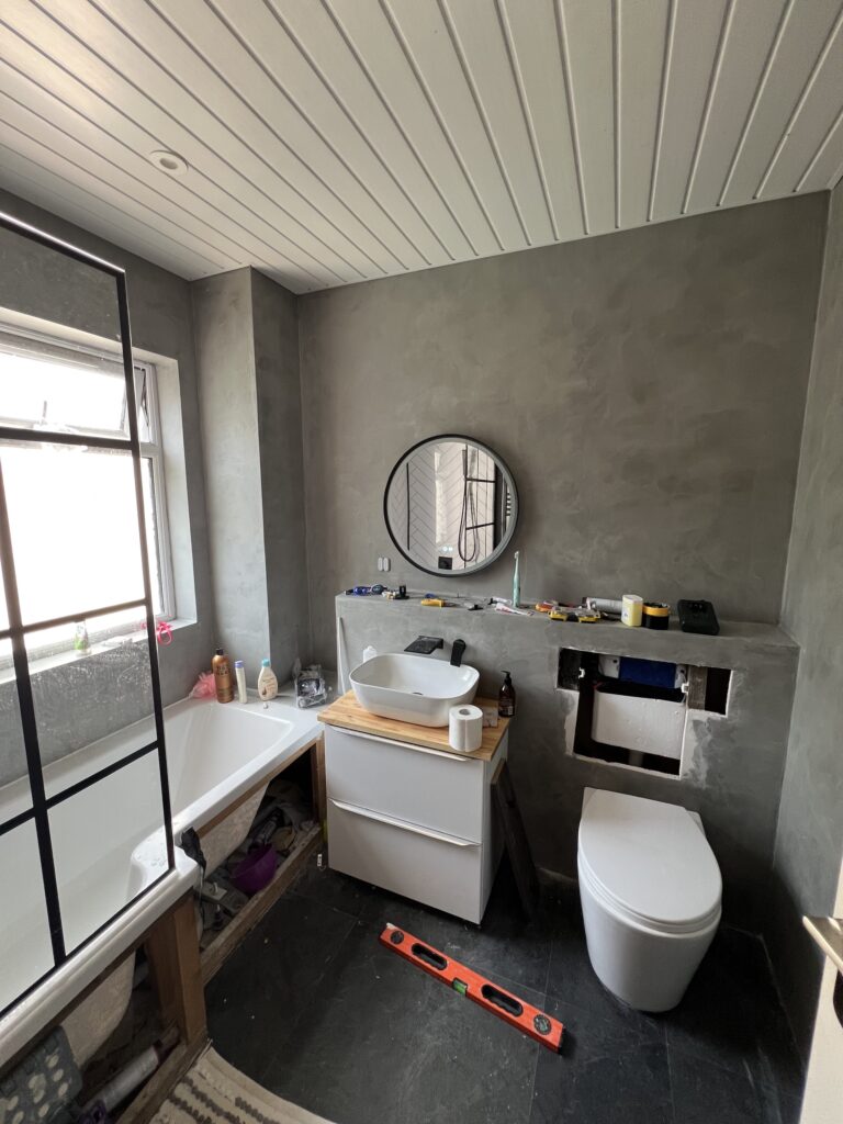 New flooring, sensor flush toilet cistern and pan, vanity